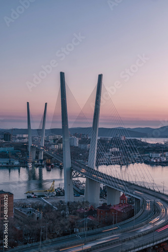 Golden bridge and Golden Horn bay at sunset, Vladivostok, Russia