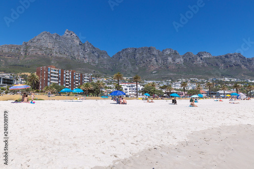 CAPE TOWN, SOUTH AFRICA - NOVEMBER, 2018: Famous Camps bay sandy beach in Cape Town