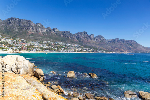 View of Camps bay beautiful beach with turquoise water and mountains in Cape Town, South Africa