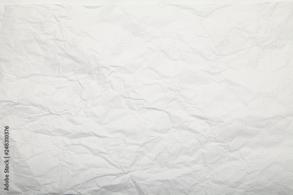 Obraz premium White crumpled paper texture.