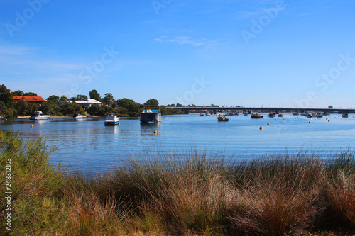 Boats in front of Canning bridge in Perth, Western Australia
