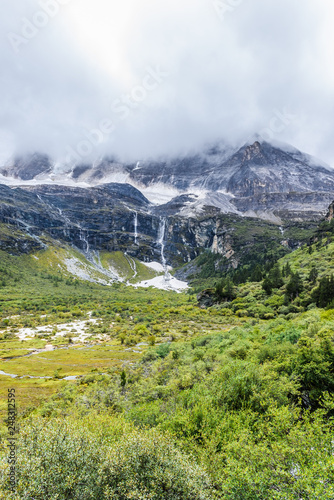 Close view of The Yangmaiyong Snow Mountain (know as “Manjusri” in Tibetan), Daocheng Yading National Nature Reserve (know as Nyidên in Tibetan), Ganzi, Sichuan, China.  photo