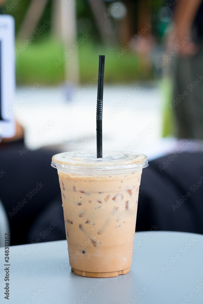 Iced coffee latte in take away plastic glass Iced coffee latte in take away plastic glass