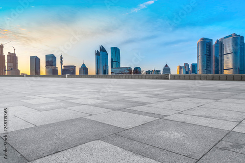 Empty Plaza Floor Bricks and the Skyline of Modern Urban Architecture in Qingdao..