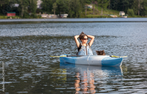 Solo Woman and Dog on a Kayak enjoyig Lesisure TIme together © Christine Glade