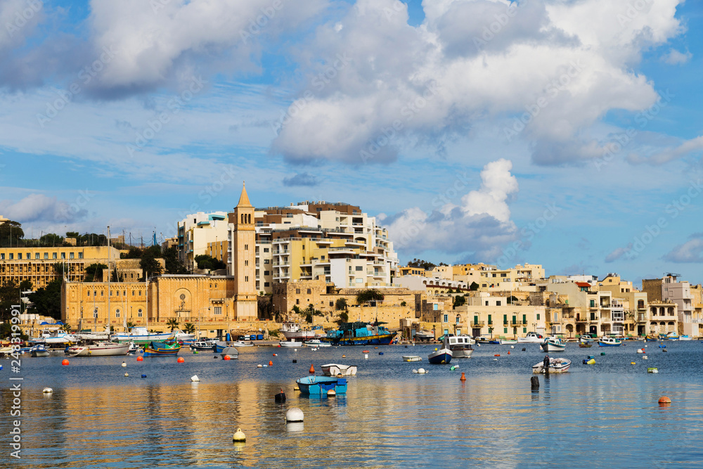 Boats and yachts in a small marine on Malta, near Marsaskala.