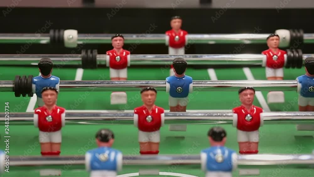 Two opponents confront each other in table football. Two opponents confront each other in table football.