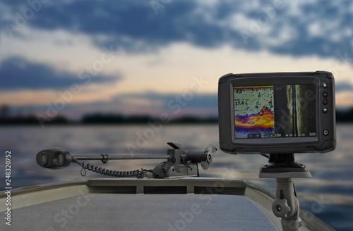 Fishing boat with fish finder, echolot, sonar and structure scaner aboard photo