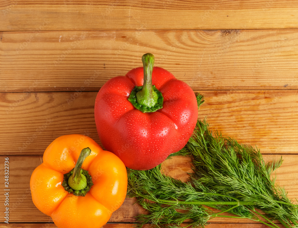Bulgarian sweet pepper and dill on the cutting Board. Bulgarian sweet pepper and dill on the cutting Board.