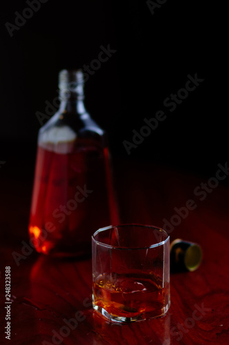 Bottle and glass of alcohol 