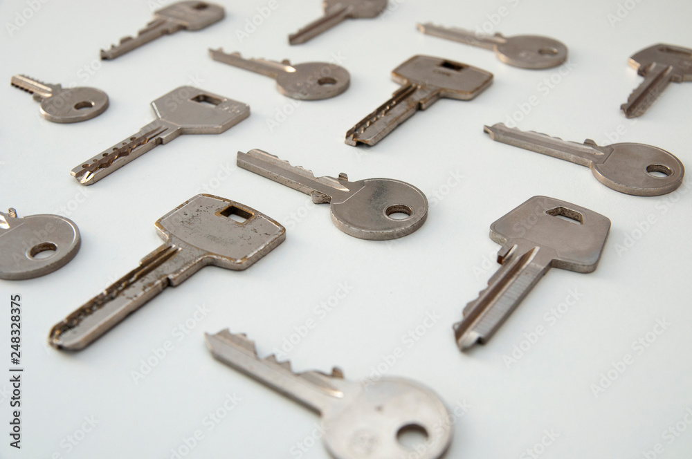 different keys isolated on white background top view side view different keys isolated on white background top view side view