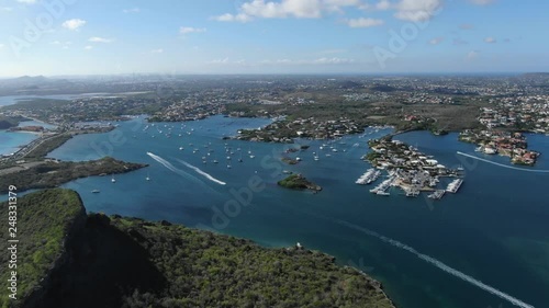 Aerial shot of Tropical Bay with Yachts photo