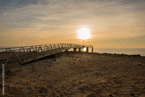 Walkway to the lookout on chilches beach at sunrise