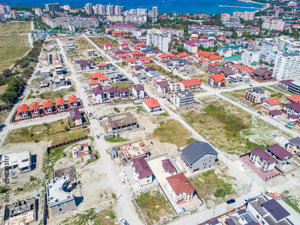 construction of cottages on the beach in Gelendzhik. Construction of the field. Construction of houses. Gelendzhik, cottage, house, field, sea, road, Black sea, pit, construction equipment, constructi