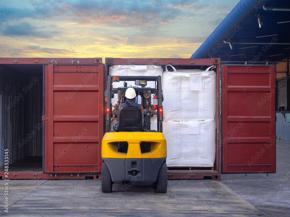 Tapioca in jumbo bags are stuffing in container by forklift at stuffing