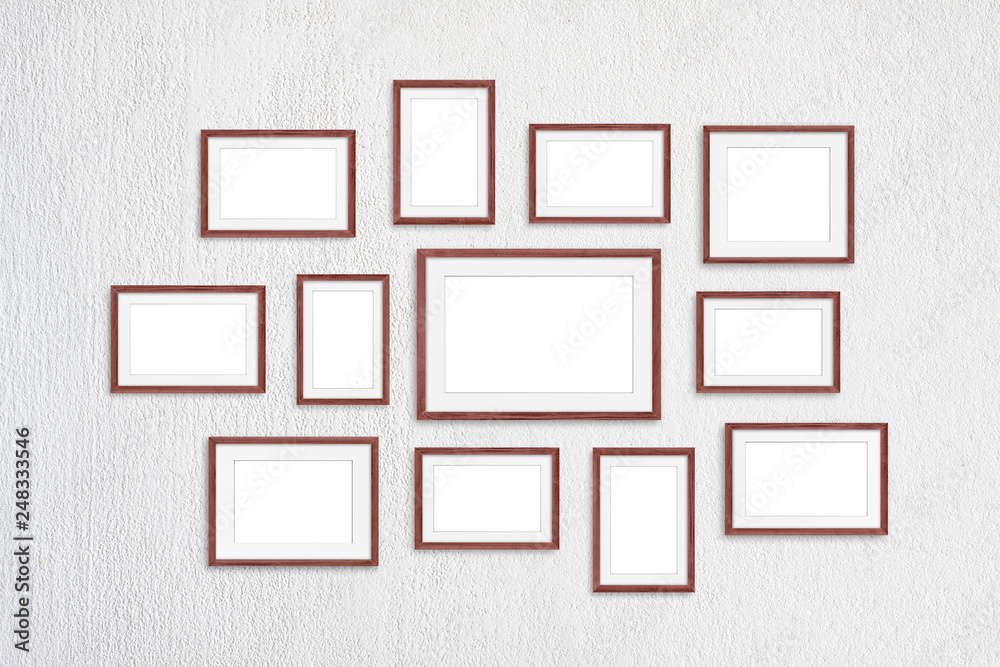 Blank frames collage, twelve brown realistic wooden frameworks isolated on white plastered wall Blank frames collage, twelve brown realistic wooden frameworks isolated on white plastered wall