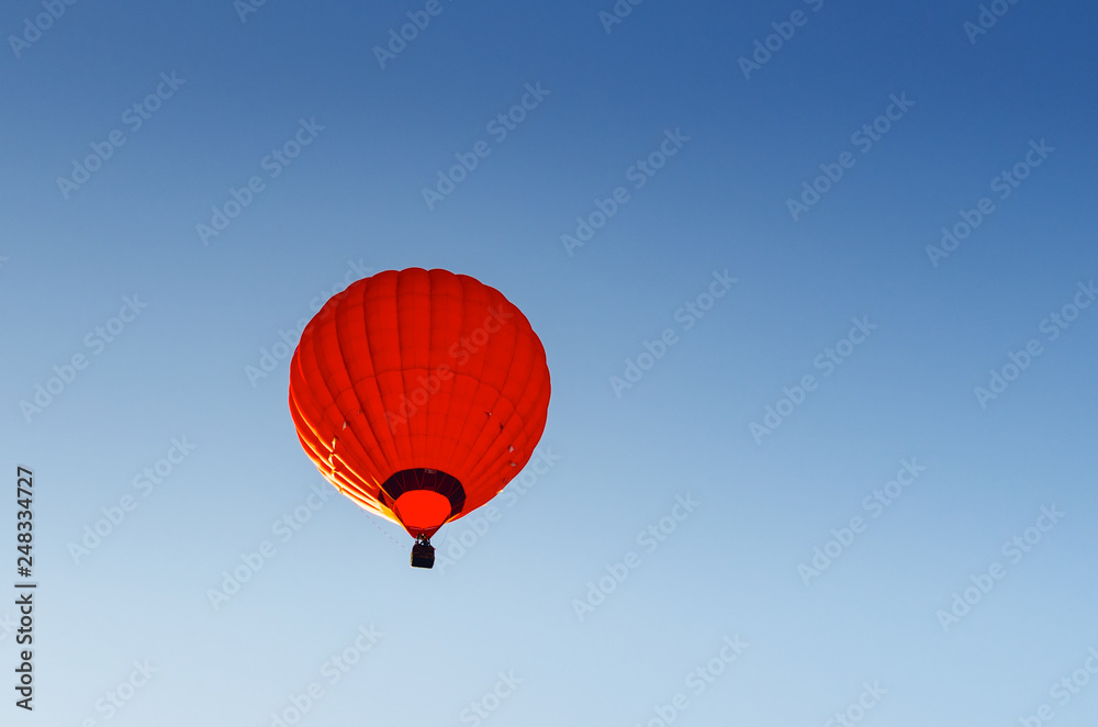 Colorful hot air balloon against the blue sky