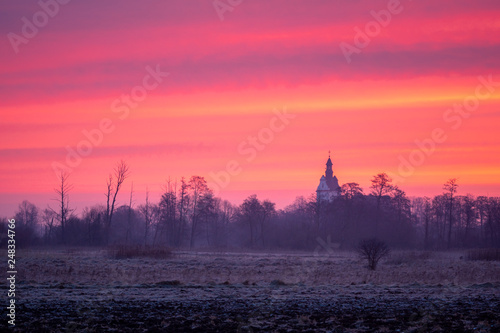 Dawn over the church in Jazgarzew near Piaseczno, Poland
