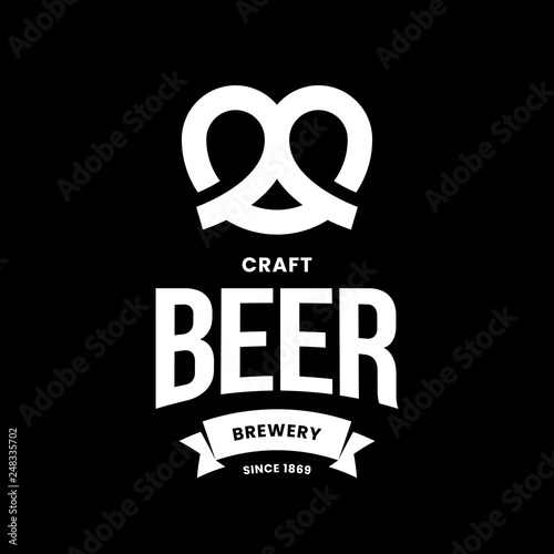 Modern craft beer drink vector logo sign for bar, pub, store, brewhouse or brewery isolated on black background. Premium quality pretzel logotype illustration. Brewing fest emblem t-shirt badge design