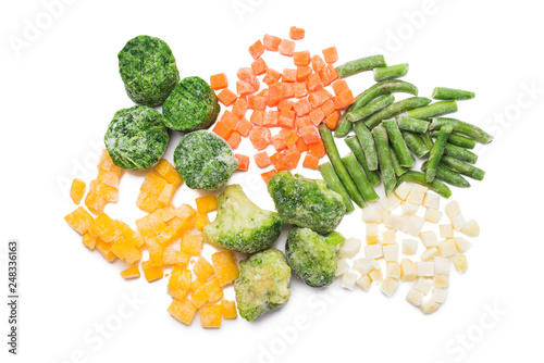 Mix of fresh frozen vegetables isolated on white background, top view