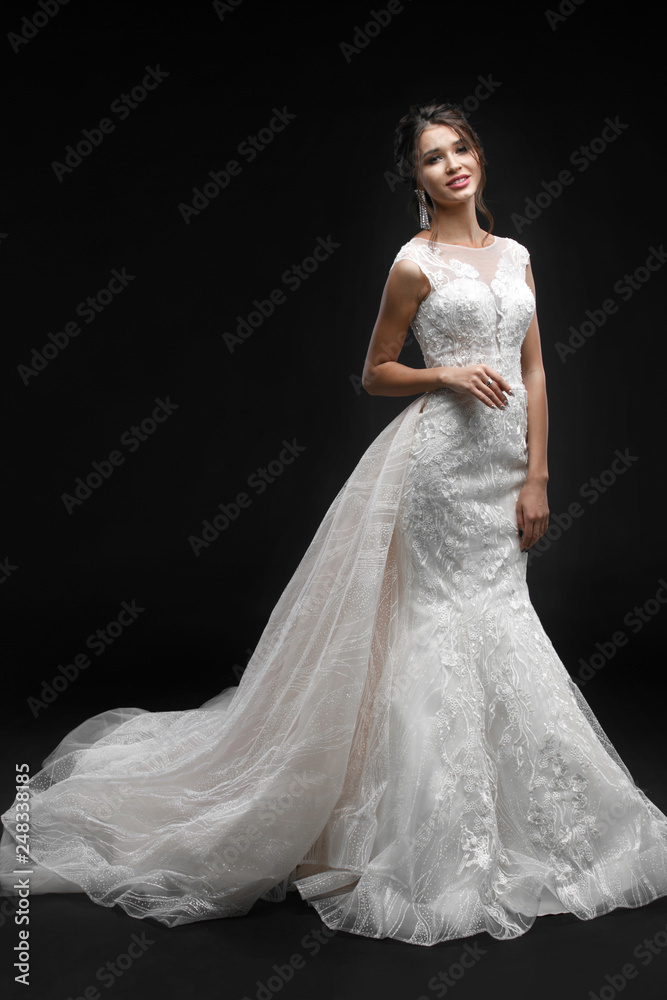 Young bride. Studio shot on black backgroung