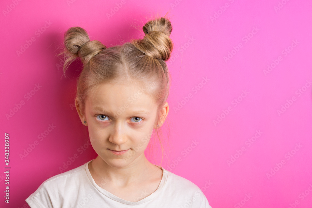 little girl blonde on a pink background little girl blonde on a pink background
