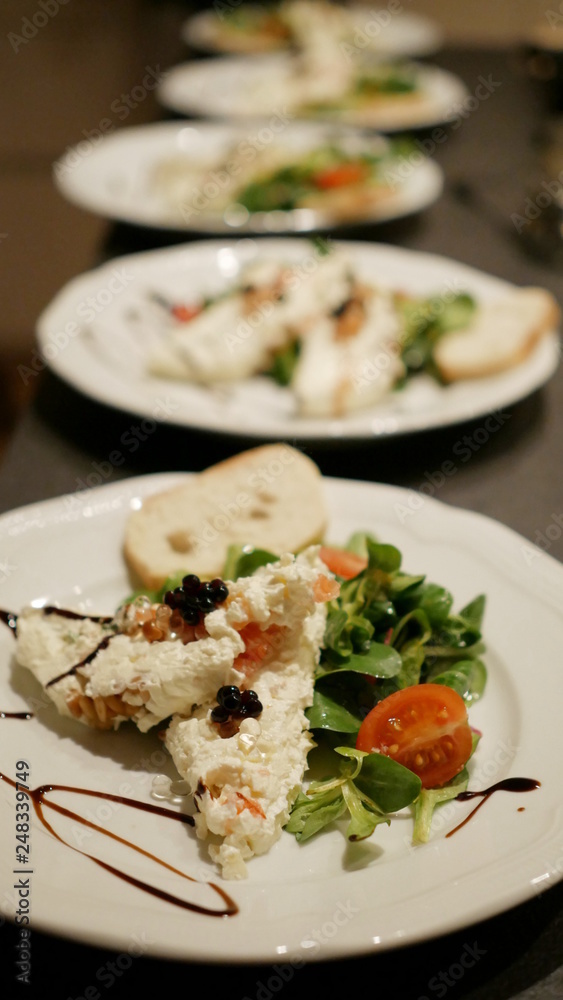 Fresh salad, valerian, tomato, cheese, caviar Fresh salad, valerian, tomato, cheese, caviar