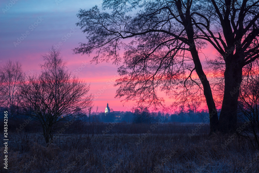 Dawn over the church in Jazgarzew near Piaseczno, Poland