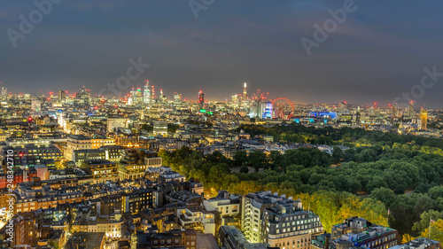 London skyline with London eye after dusk © offcaania