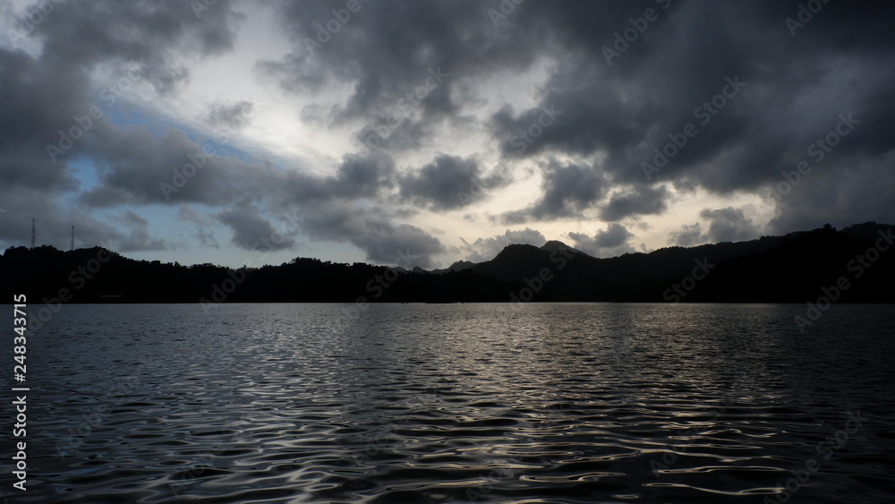 the view of the reddish blue sky at the lake at sunset the view of the reddish blue sky at the lake at sunset
