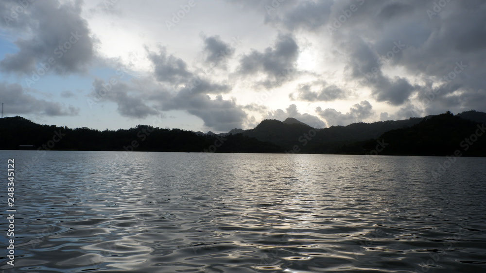 the view of the reddish blue sky at the lake at sunset the view of the reddish blue sky at the lake at sunset