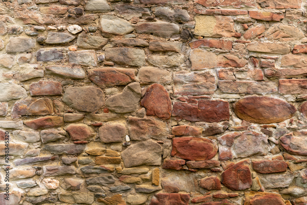 Medieval Stone Wall Texture. Old brick and stone wall with thick grout and very rough, irregular surface. Medieval Stone Wall Texture. Old brick and stone wall with thick grout and very rough, irregular surface.