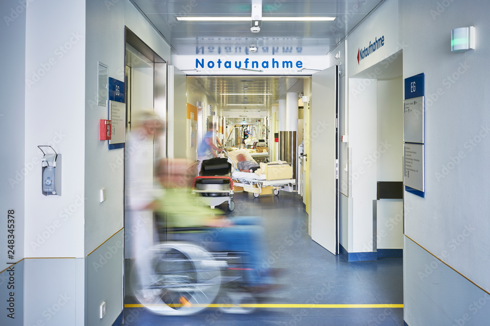 Wunschmotiv: Notaufnahme Eingang Arzt Rollstuhl Krankenhaus #248345378