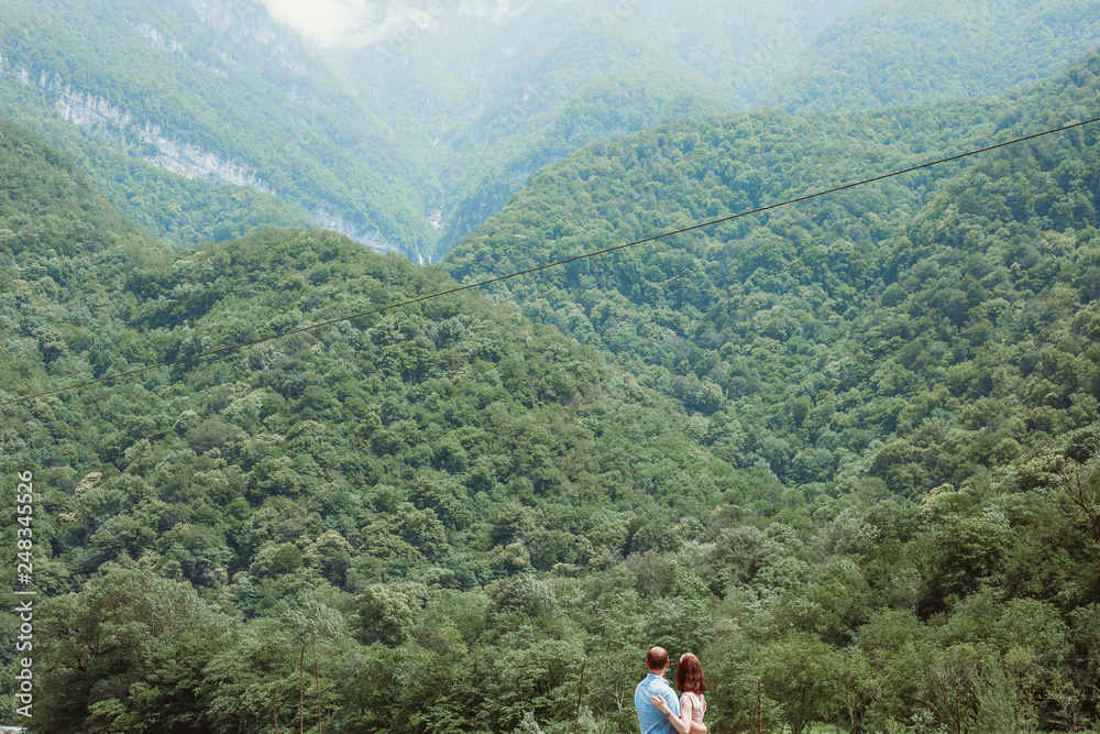couple on top of mountain
