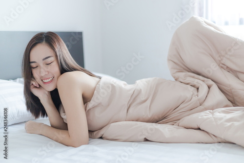Sexy beautiful woman smile on bed