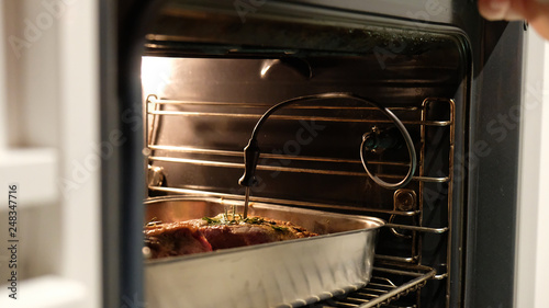cooking the steak in the oven