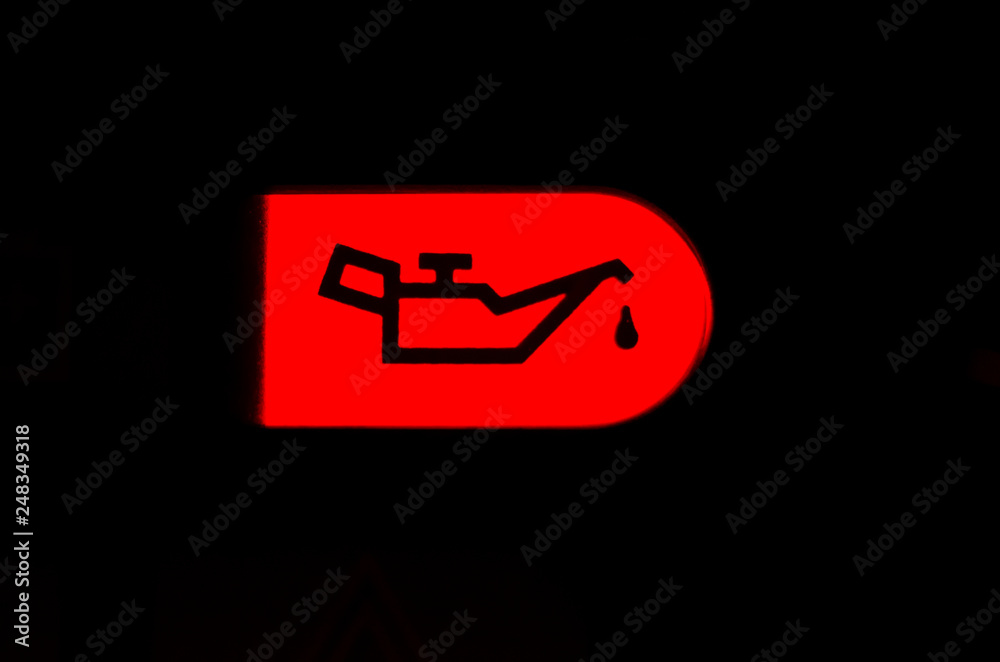 Screen symbols Oil lamp warning light incar dashboard, close up Stock