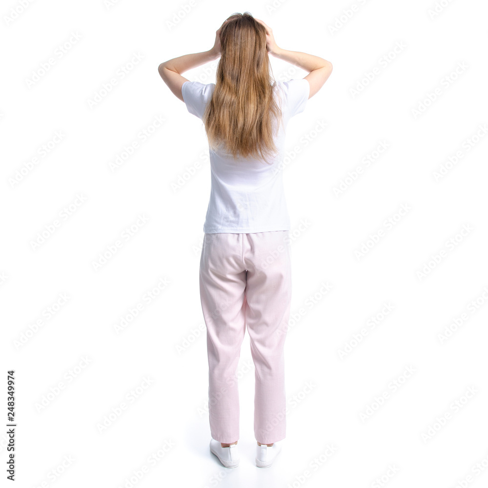 Woman in white t-shirt standing holding head on white background isolation, back view Woman in white t-shirt standing holding head on white background isolation, back view