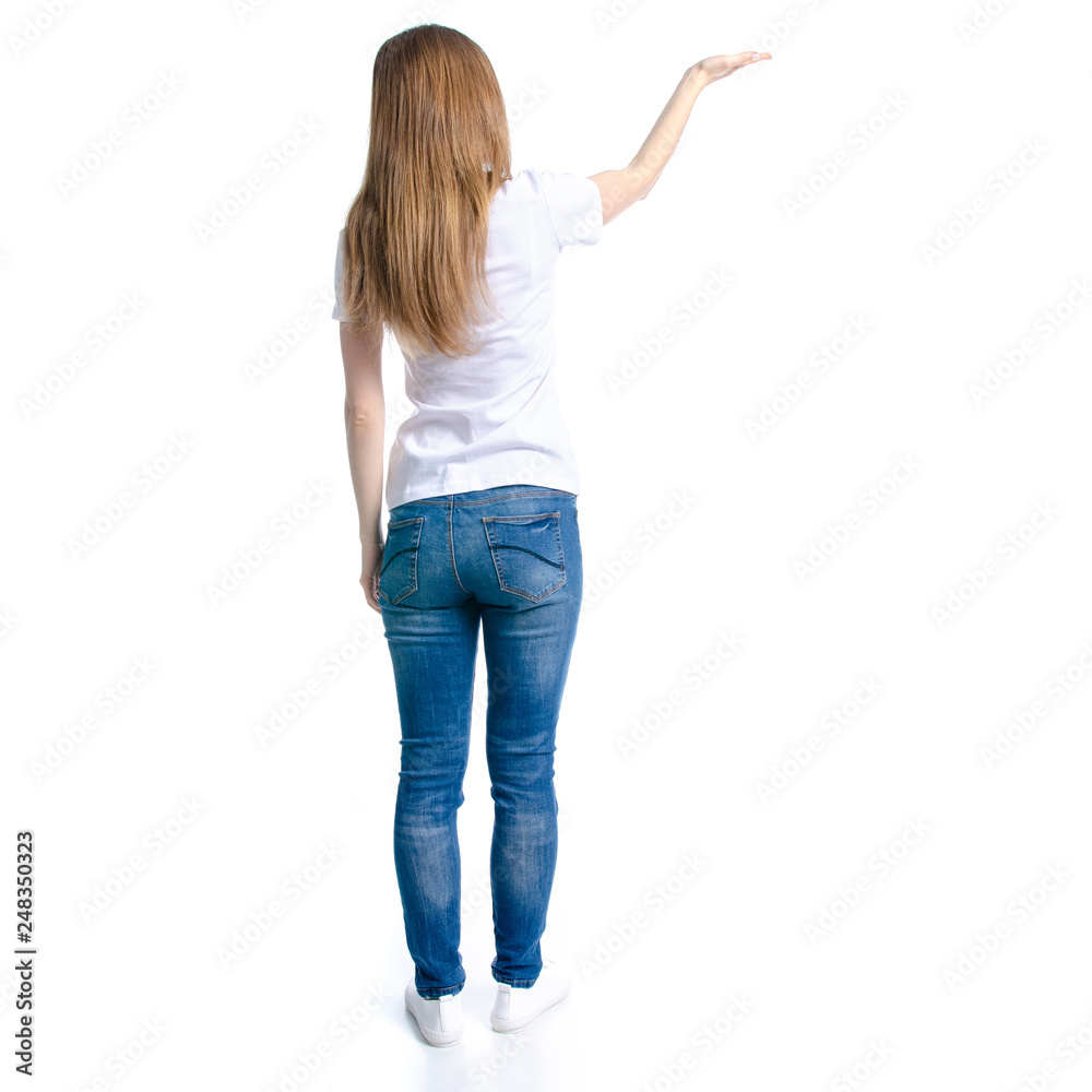 Woman in jeans and white t-shirt showing on white background isolation, back view Woman in jeans and white t-shirt showing on white background isolation, back view