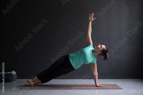 Model doing Side Plank Posture, Pose of Vashista, Vasisthasana
