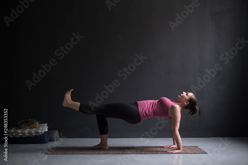 woman practicing yoga concept, doing Purvottanasana exercise, Upward Plank pose