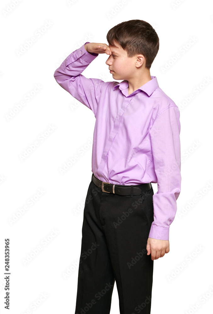 Boy posing on white background, black trousers and purple shirt Boy posing on white background, black trousers and purple shirt