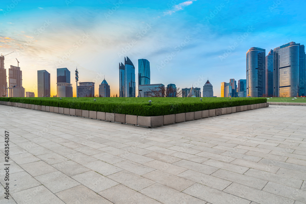 Empty Plaza Floor Bricks and the Skyline of Modern Urban Architecture in Qingdao.. Empty Plaza Floor Bricks and the Skyline of Modern Urban Architecture in Qingdao..
