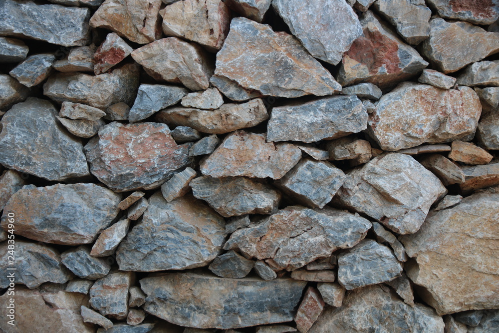 wall of stones of different sizes, background wall of stones of different sizes, background