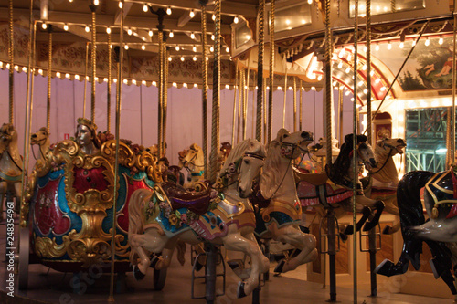 Fototapeta Naklejka Na Ścianę i Meble -  Beautiful carousel on a late night fun fair