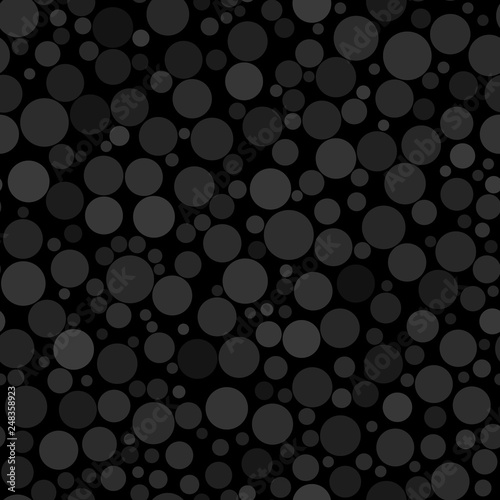 Abstract seamless pattern of circles of different sizes in black and gray colors © Aleksei Solovev