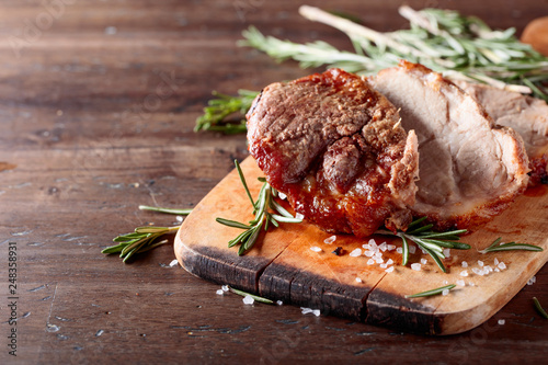 Oven-baked pork with rosemary and spices.