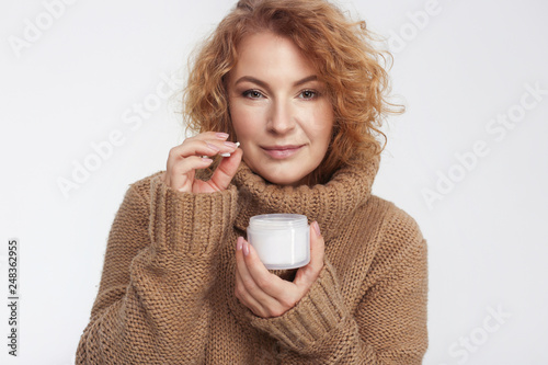 Anti-ageing Concept: Woman In Her Forties With Skin Cream