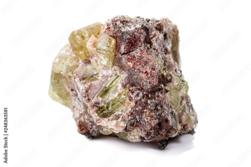 Macro mineral stone.Golden Apatite on a white background Macro mineral stone.Golden Apatite on a white background