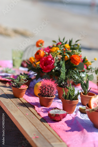 Festive table decor, beautiful event venue, creative beach wedding decor,